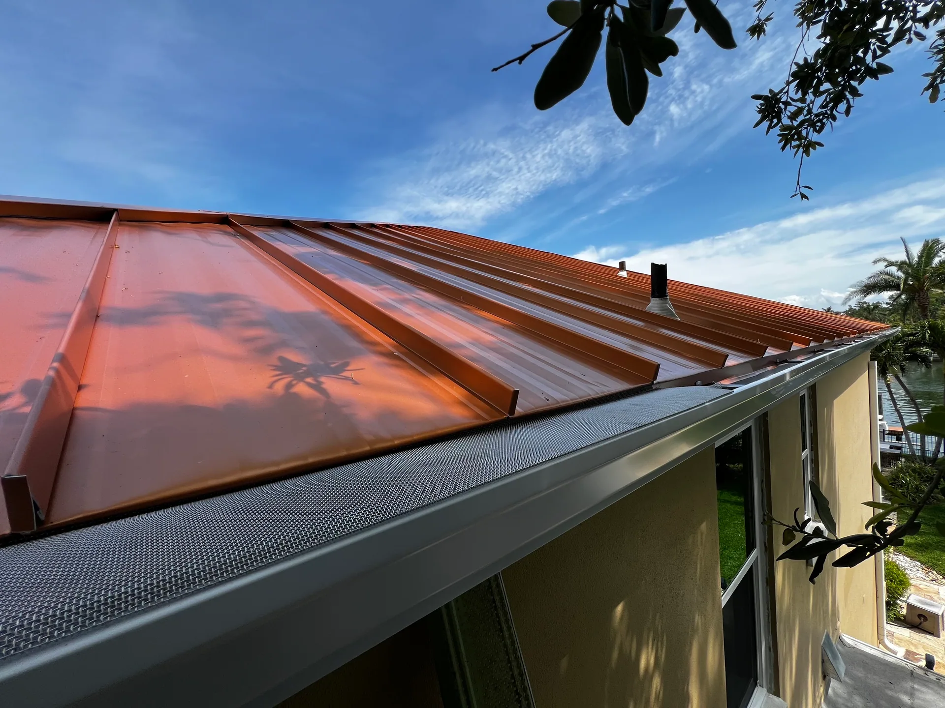 Copper standing seam roof mesh gutter guard waterfront, Sanford